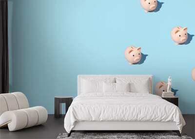 piggy bank izometric pattern on bright light blue background. Minimal flat lay texture. Abstract trendy fresh concept. Wall mural