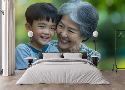 Asian grandson playing and laughing together with grandmother. Happy Asian family children having fun and playing with grandparents Wall mural