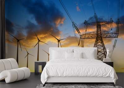 High voltage tower and wind turbines against the sunset Wall mural