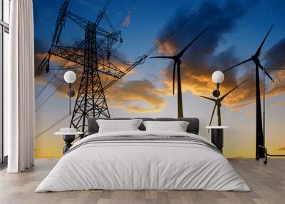 High voltage tower and wind turbines against the sunset Wall mural