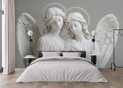 Two different side views of an angel statue holding a cross, one on the left and the other on the right side, against a grey background with a marble texture, in high quality. Wall mural