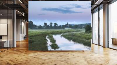 Beautiful vibrant Summer sunrise over English countryside landsc Wall mural