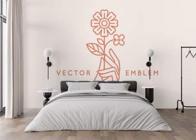 Vector abstract logo design template in trendy linear minimal style - hand with flower Wall mural