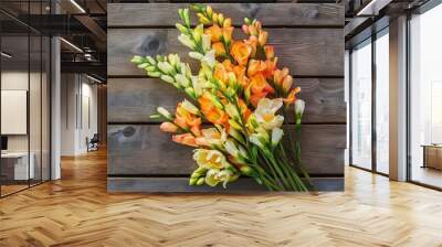 Fresh freesia flowers on wooden table background Wall mural