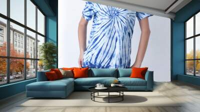 woman in indigo tie dye style t-shirt on white background Wall mural