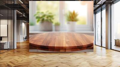 a round wooden table top with a natural edge, situated on a blurred kitchen counter background. Wall mural