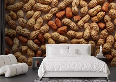 Close-up of a collection of peanut shells and whole peanuts, arranged to create an interesting texture pattern Wall mural