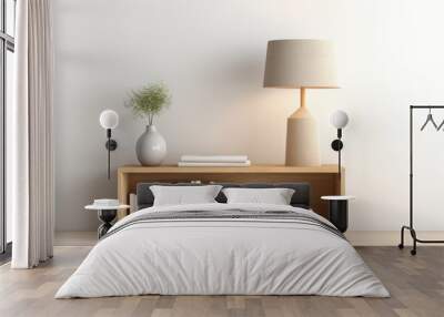 contemporary table lamp stands next to some books on a minimalist wooden sideboard. Wall mural