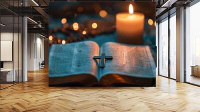 Open Bible with a cross necklace and candlelight Wall mural