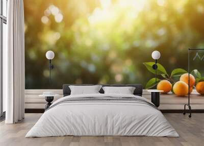 Wooden table leaves empty space and blurred background, orange trees with fruits, Wall mural