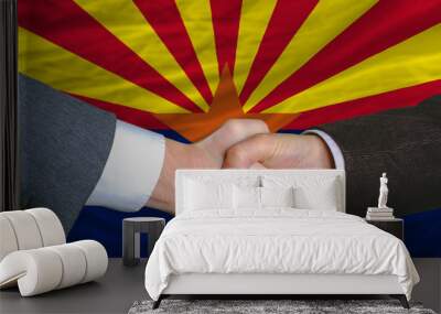 in front of american state flag of arizona two businessmen hands Wall mural