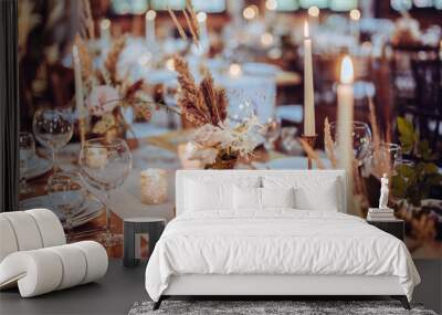 rustic wedding decorations with flowers and candles. banquet decor. picture with soft focus Wall mural