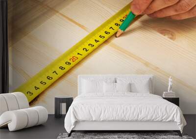 Marking with pencil and ruler on wooden board Wall mural