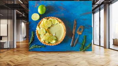 Appetizing beautiful lemon muffin in a light key, beautiful still life with a delicious cake on the table. Sweet delicacy in the pastry shop. lime dessert bakery products Wall mural