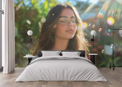 beautiful young woman with long flowing hair and stylish eyeglasses closes her eyes, using AI technology to immerse herself in a holographic garden environment and breathe clean, fresh air Wall mural