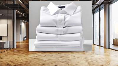 Clean fresh white shirts are stacked after washing Wall mural