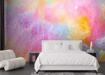 Knitted surface woolen items rainbow colored as a background. Closeup of soft multicolored knitted texture patterns. Warm winter clothes. Background textile surface with copy space for text. blurred Wall mural