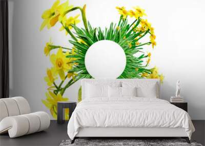 the circle from green gass and narcissus flowers Wall mural