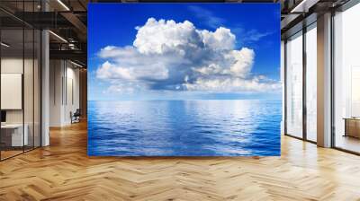 White cumulus clouds in blue sky over sea landscape, big cloud above ocean water panorama, horizon, beautiful tropical sunny summer day seascape panoramic view, cloudy weather, cloudscape, copy space Wall mural