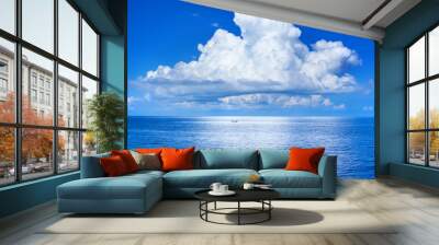 White cumulus clouds in blue sky over sea landscape, big cloud above ocean water panorama, horizon, beautiful tropical sunny summer day seascape panoramic view, cloudy weather, cloudscape, copy space Wall mural