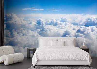 white clouds on blue sky background close up, cumulus clouds high in azure skies, beautiful aerial c Wall mural