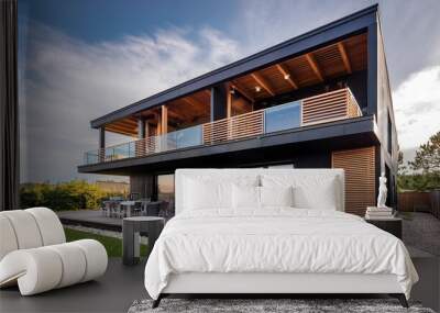 Modern Black Two Storey House With Wooden Beams And A Large Deck Wall mural