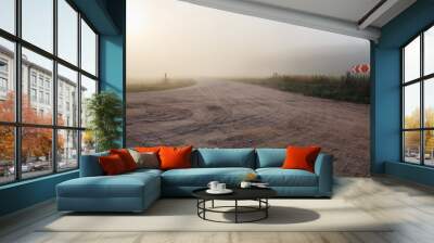 Gravel road and fog. Rural landscape. Panoramic shot. Wall mural