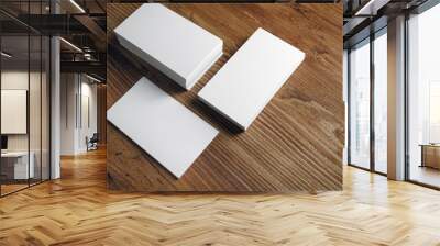 Photo of blank white business cards on wooden background. Template for ID. Wall mural