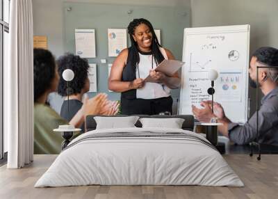 black business woman giving flipchart presentation in the office. . Wall mural