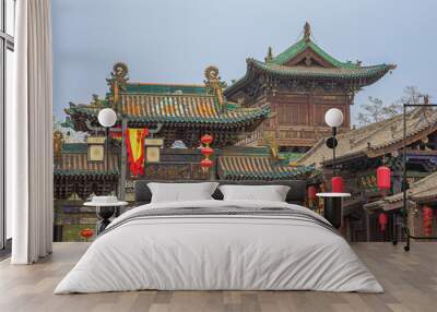 Looking up at a street gate in the old town of Pingyao Wall mural