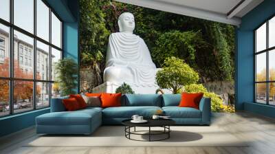 large white marble statue of Buddha outside  Wall mural