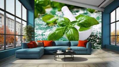 Organic green basil in a mortar Wall mural