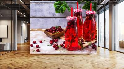 Transparent red drink of berries Wall mural