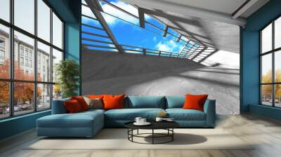 Concrete room wall construction on cloudy sky background Wall mural