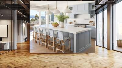 coastal interior design concept dining natural material cosy comfort Woven pendant lights bring a modern coastal feeling to this light and airy kitchen The stylish counter stools are a favorite theme Wall mural