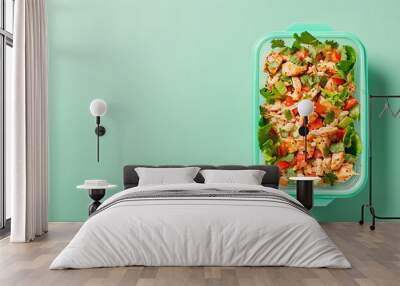 Fresh and vibrant Mexican chicken salad in clear container, showcasing colorful ingredients like lettuce, tomatoes, and herbs, perfect for healthy meal Wall mural