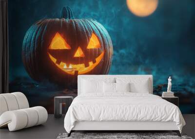 A carved pumpkin with a lit candle inside glows ominously in the dark. Wall mural