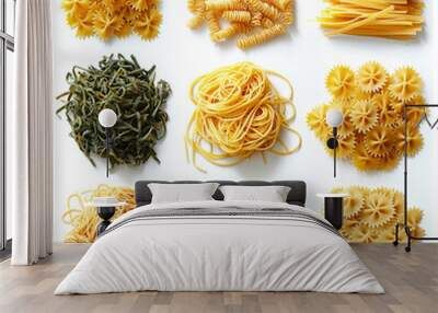 Assortment of dried pasta, including spaghetti, farfalle, and linguine, on a white background. Wall mural