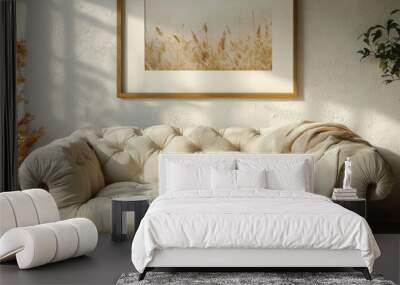 Cozy living room with a tufted white sofa and a plant in a woven basket. Wall mural