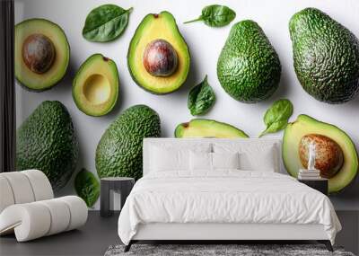 Fresh avocados and leaves on white background. Wall mural