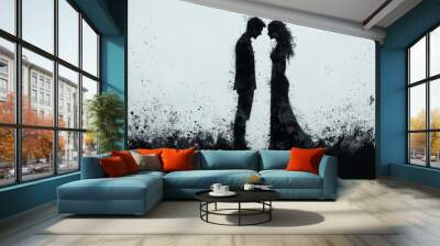 Silhouettes of a man and woman in a romantic embrace against a splattered black and white background. Wall mural