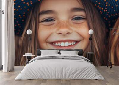 Smiling girl in a witch hat for Halloween Wall mural