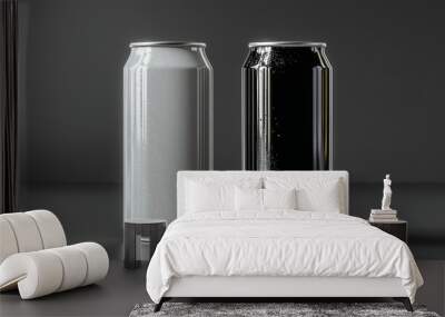 Two aluminum cans, one white and one black, sit on a gray surface. Wall mural