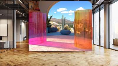 Two colorful glass cylinders stand in front of a window with a desert view. Wall mural