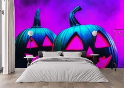 Two glowing jack-o'-lanterns in a spooky forest. Wall mural