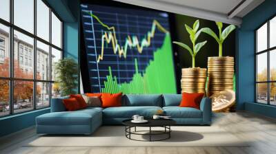 A seedling is growing on a coin lying on the ground. Green investment concept, increasing money to invest. Digital financial growth concept with green curve chart stock market yield on the background Wall mural