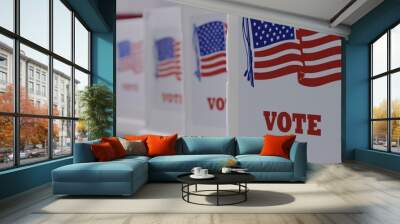 CU straight on row of voting booths at polling station during American election. US flag in background. Wall mural