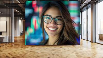 Portrait of a happy smiling confident businesswoman wearing glasses against a background of stock market charts Wall mural