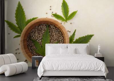 Cannabis seeds and green leaves. Vegetarian healthy food. Healthy lifestyle. Flat lay, top view. Wall mural