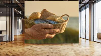 Christianity, religion, Bible concept. Five loaves of bread and two fish Wall mural